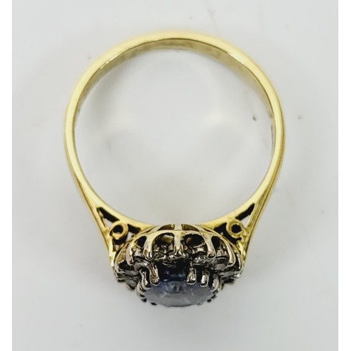 12 - A hallmarked 18ct gold Ceylon sapphire and diamond cluster ring A/F, size M/N, gross weight 4.2g. UK... 