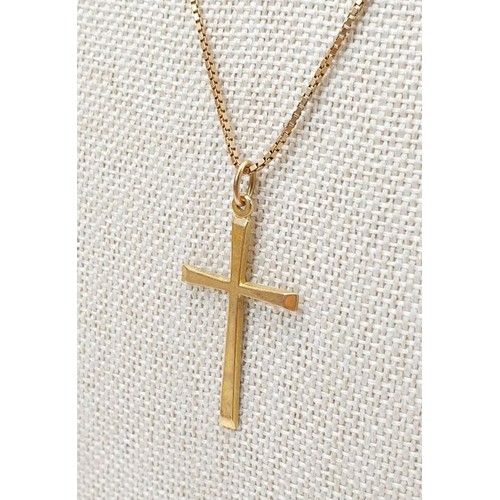 9 - A hallmarked 9ct gold cross on a 9ct gold chain, chain length 18