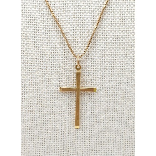 9 - A hallmarked 9ct gold cross on a 9ct gold chain, chain length 18