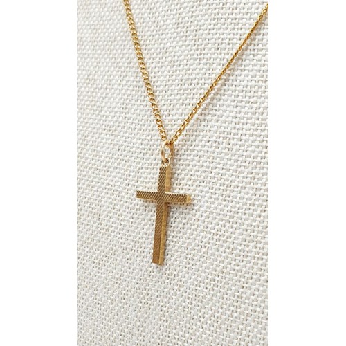 10 - A Chester hallmarked 9ct gold cross on a 9ct gold chain, chain length 16