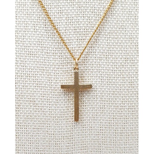 10 - A Chester hallmarked 9ct gold cross on a 9ct gold chain, chain length 16