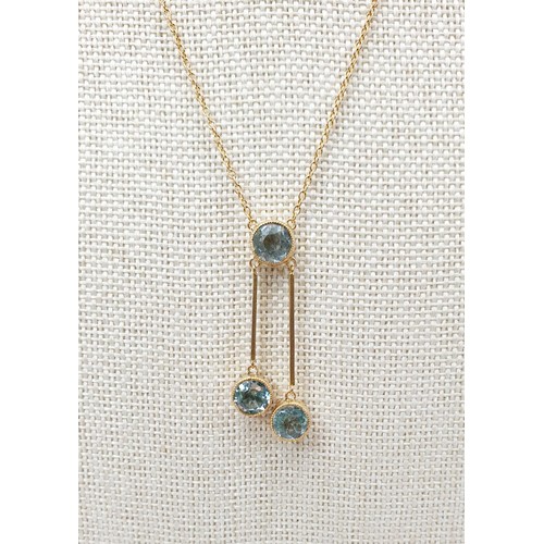 13 - A 1920s 9ct gold and aquamarine set pendant, chain length 17