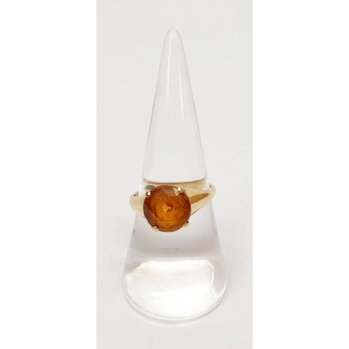 19 - A 9ct gold ring set with citrine, gross weight 3.4g, size O. UK shipping £14.