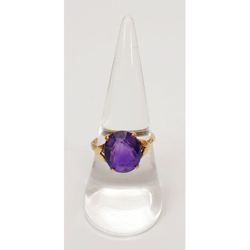 20 - A 9ct gold ring set with an amethyst, gross weight 2.9g, size O/P. UK shipping £14.