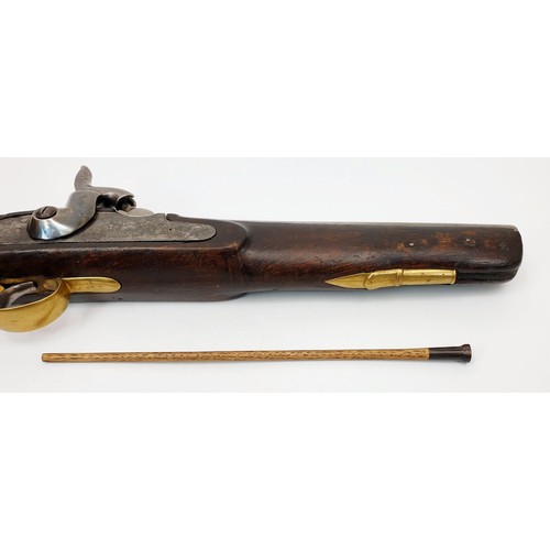 71 - A 19th century military percussion pistol, having full walnut stock, brass furniture, barrel stamped... 