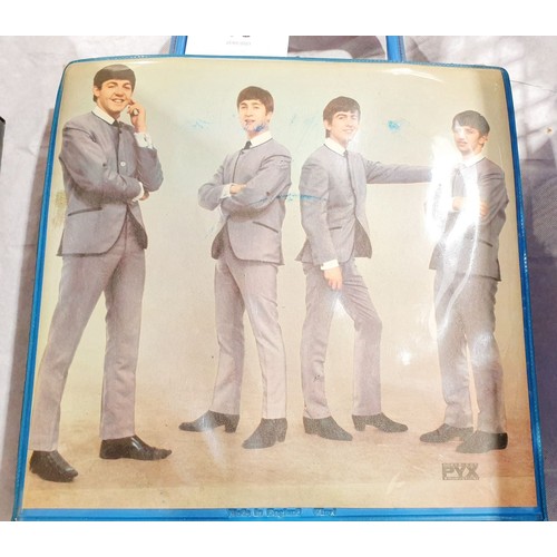 78 - A The Beatles Pyx Blue singles carry case with sixteen 7