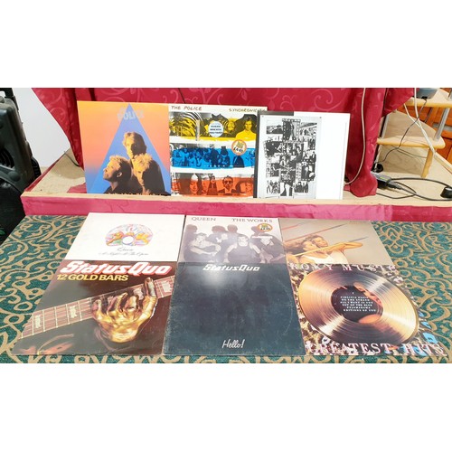 87 - Nine vinyl LPs including Queen, The Police and Roxy Music. UK shipping £14.