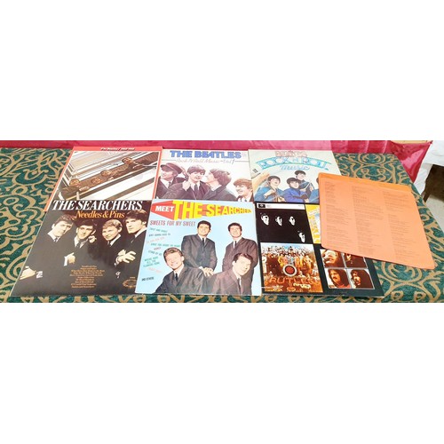 91 - Seven vinyl LPs including The Beatles Red album and nineteen 7