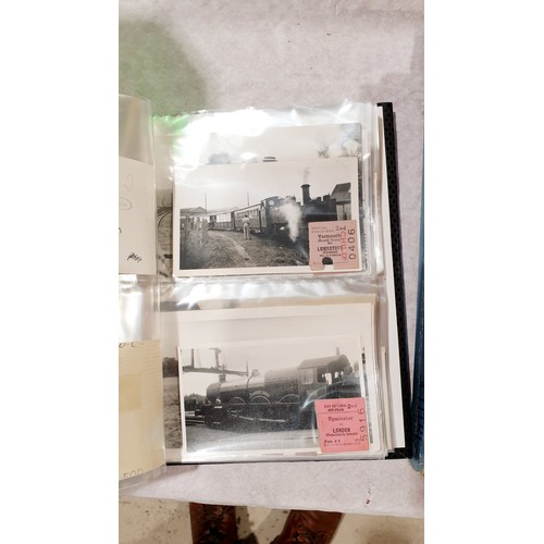 124 - An album of vintage photographs of mainly steam trains together with tickets. UK shipping £14.