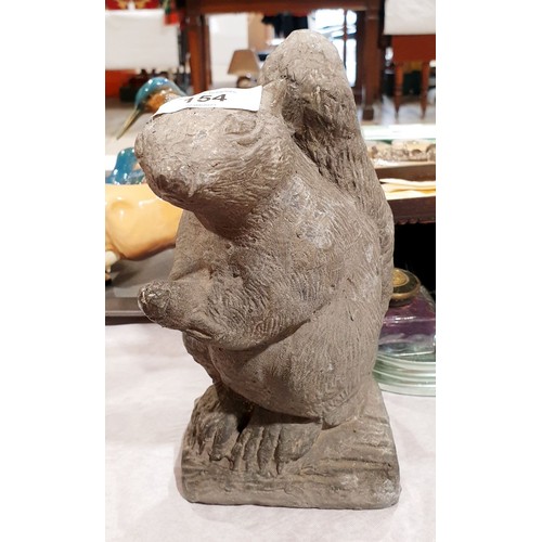 154 - A solid cast lead squirrel garden ornament, height 8