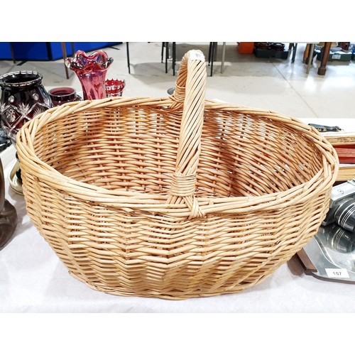 158 - A large vintage wicker hand basket, length 20.5