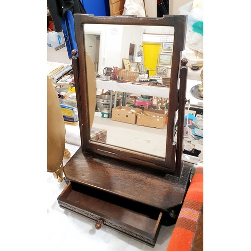 192 - An antique oak toilet mirror, width 20