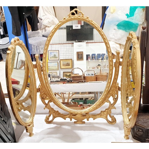 194 - A three leaf gilt frame toilet mirror, height 26.5