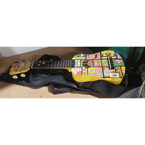 196 - A Sponge Bob Square Pants ukulele with strap and case. No shipping. Arrange collection or your own p... 