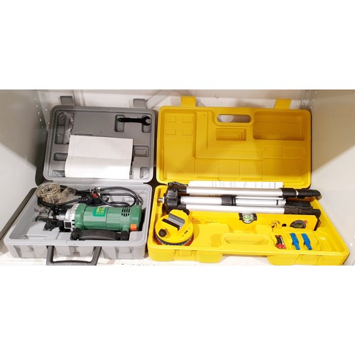 206 - A laser level and a spiral saw. No shipping. Arrange collection or your own packer and shipper, plea... 