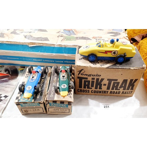 231 - A vintage boxed Trik Trak battery operated game together with two vintage boxed Scalextric cars. No ... 