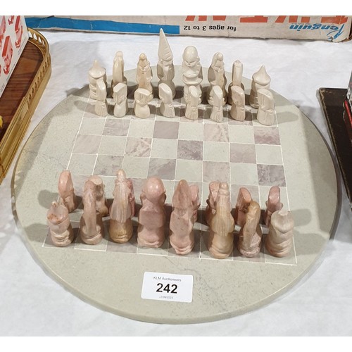 242 - A hard stone chess set, diameter 12