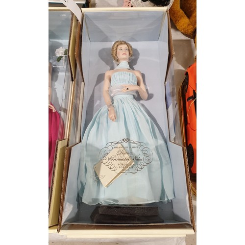 244 - An unopened boxed Franklin Mint Princess Diana porcelain portrait doll, box length 21.75