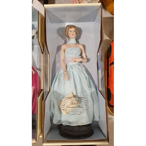 244 - An unopened boxed Franklin Mint Princess Diana porcelain portrait doll, box length 21.75