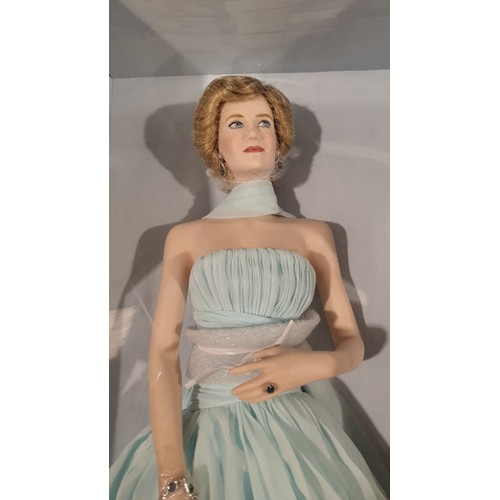 244 - An unopened boxed Franklin Mint Princess Diana porcelain portrait doll, box length 21.75