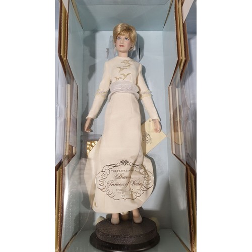 248 - An unopened boxed Franklin Mint Princess Diana porcelain portrait doll, box length 21.75