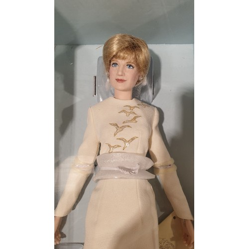 248 - An unopened boxed Franklin Mint Princess Diana porcelain portrait doll, box length 21.75