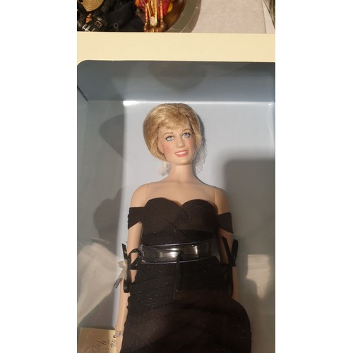 250 - An unopened boxed Franklin Mint Princess Diana porcelain portrait doll, box length 18.25