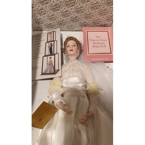 251 - A Franklin Mint porcelain Princess Grace doll, height 18