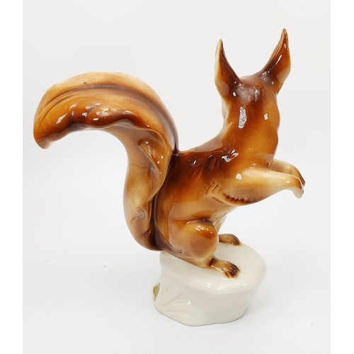 283 - A Royal Dux figure of a red squirrel, height 9.5