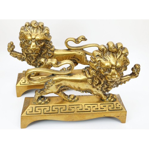 296 - A pair of antique decorative brass lions, length 11.5