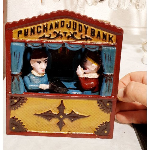 300 - A reproduction cast iron Punch and Judy moneybox, height 7