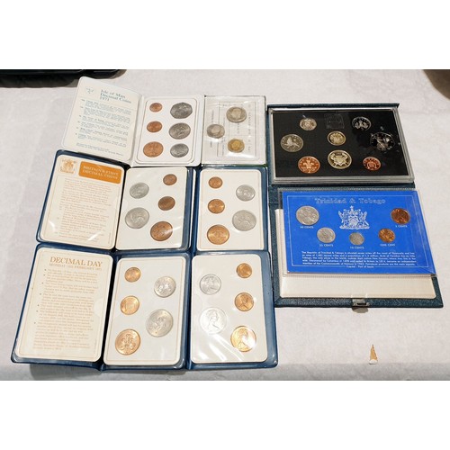 340 - A 1986 proof coin set and other coins sets. UK shipping £14.