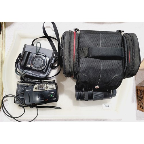 181 - A Canon Sure Shot AF-7 camera, an Olympus 3D camera, a Canon 75-300mm lens and a carry case. UK ship... 