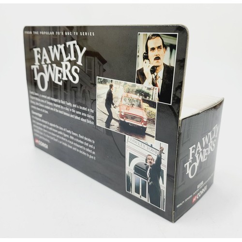 56 - A boxed Corgi Fawlty Towers Austin 1300 Estate & Basil Fawlty, 00802. UK shipping £14. We combine sh... 