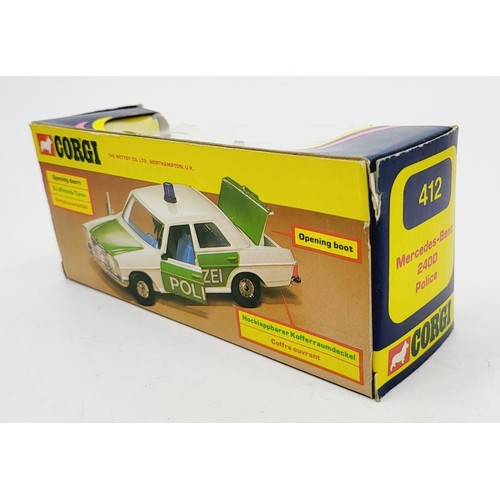 131 - A vintage boxed Corgi Mercedes Benz 240D Police, 412. UK shipping £14. We combine shipping.