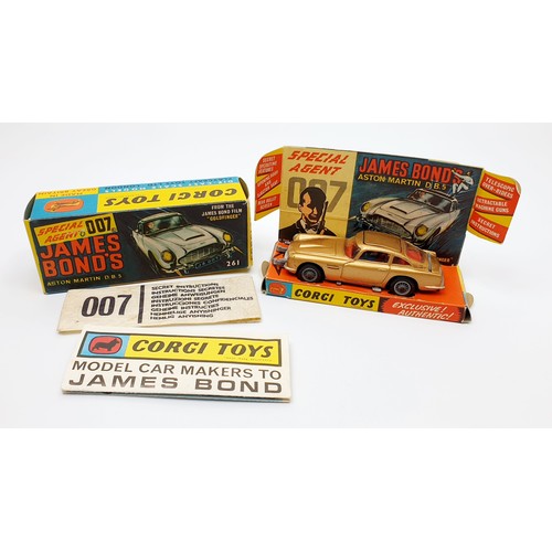 24 - A vintage boxed Corgi James Bond's Aston Martin D.B.5, 261 with inner display, Corgi toys leaflet an... 