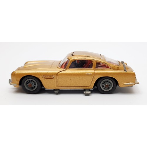 24 - A vintage boxed Corgi James Bond's Aston Martin D.B.5, 261 with inner display, Corgi toys leaflet an... 