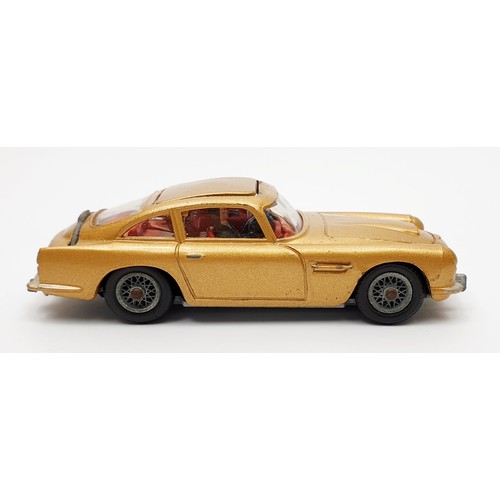 24 - A vintage boxed Corgi James Bond's Aston Martin D.B.5, 261 with inner display, Corgi toys leaflet an... 