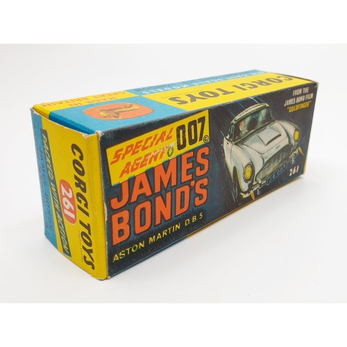 24 - A vintage boxed Corgi James Bond's Aston Martin D.B.5, 261 with inner display, Corgi toys leaflet an... 