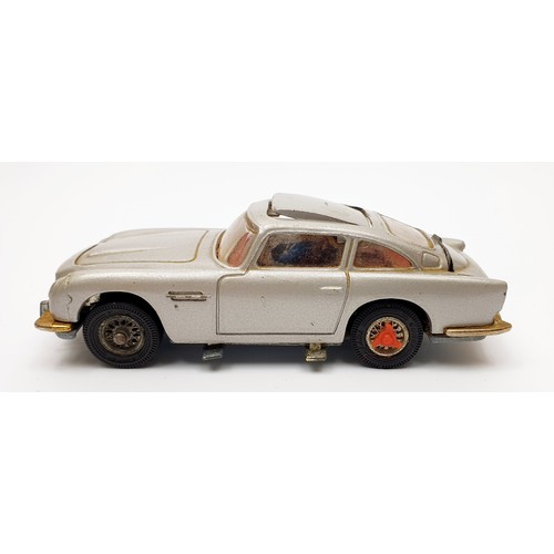 27 - A vintage boxed Corgi James Bond Aston Martin D.B.5, 270. UK shipping £14. We combine shipping.