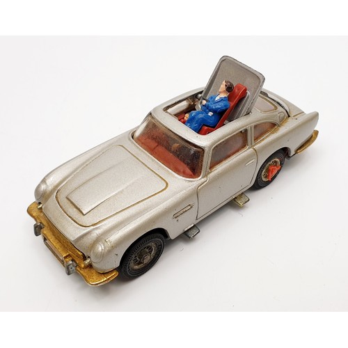 27 - A vintage boxed Corgi James Bond Aston Martin D.B.5, 270. UK shipping £14. We combine shipping.