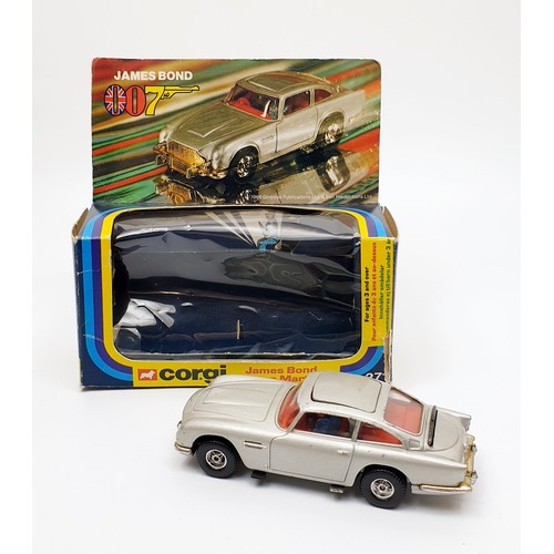 29 - A vintage boxed Corgi James Bond Aston Martin D.B.5, 271. UK shipping £14. We combine shipping.