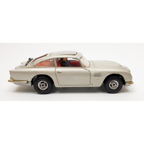 29 - A vintage boxed Corgi James Bond Aston Martin D.B.5, 271. UK shipping £14. We combine shipping.