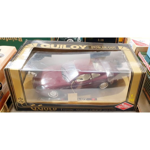 228 - A vintage boxed Hugo Boss remote control car together with a boxed model of an Aston Martin DB7. UK ... 