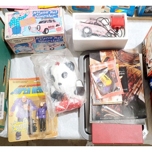 235 - A selection of toys and games including a boxed Roland Rat remote control Ratmobile, a Sooty Sue pup... 