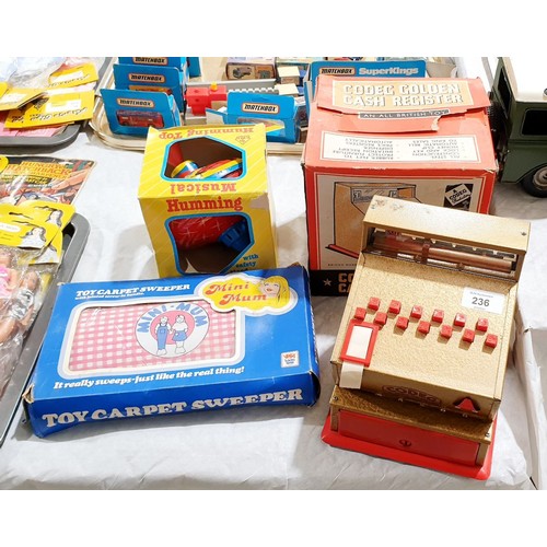 236 - Vintage boxed toys: Codeg Golden Cash Register, Mini Mum toy carpet sweeper and a humming spinning t... 