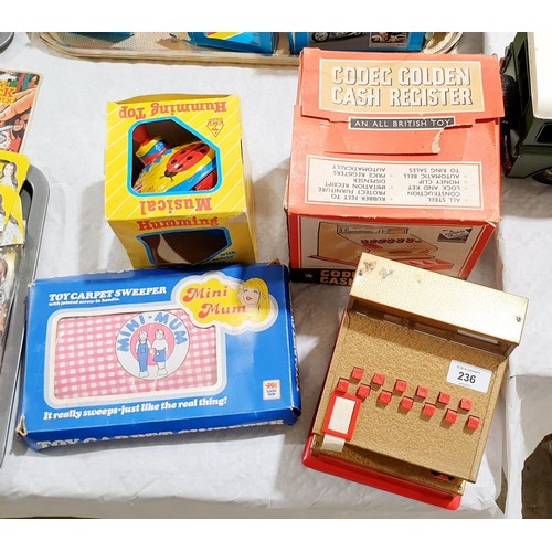 236 - Vintage boxed toys: Codeg Golden Cash Register, Mini Mum toy carpet sweeper and a humming spinning t... 