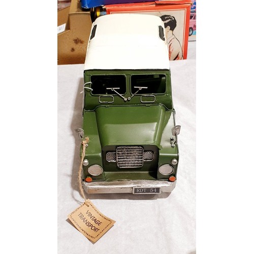 238 - A new tin plate model of a Classic Land Rover, length 12