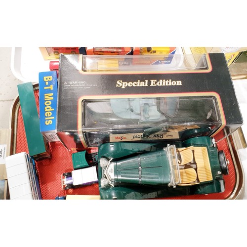 250 - Boxed and loose toy vehicles including a Maisto boxed model of a Jaguar XK8. UK shipping £14.