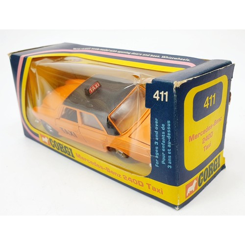 163 - A vintage boxed Corgi Mercedes Benz 240 Taxi, 411. UK shipping £14. We combine shipping.